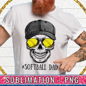 May include: A white t-shirt with a black and white skull wearing a black baseball cap and yellow softball sunglasses. The text '#SOFTBALL DAD' is printed below the skull.