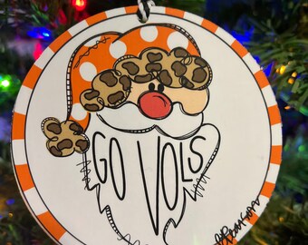 Adorno navideño Spirit Santa con diseño original dibujado a mano.