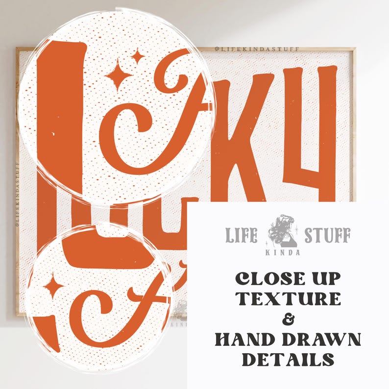 May include: A framed print with the words "LIFE KINDA STUFF" in orange, stylized lettering. The background is white with a speckled texture. The print also includes the text "CLOSE UP TEXTURE & HAND DRAWN DETAILS".