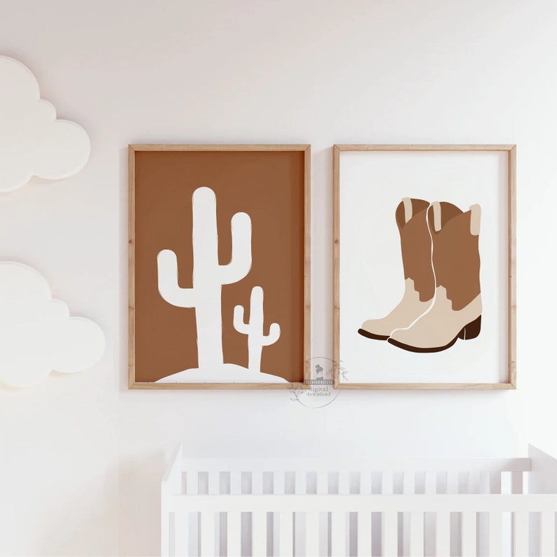 May include: Two framed prints, one with a brown background and white cactus silhouettes, the other with a white background and brown cowboy boots.