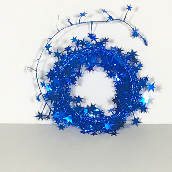 Star Garland on wire measures 25 feet long. Add to your centerpieces and arrangements