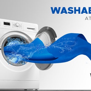 May include: A white washing machine with a blue fabric coming out of the door. The fabric is wet and has water droplets on it. The text "WASHABLE AT 30&deg;C" is displayed above the washing machine. A washing instruction symbol is displayed below the washing machine, showing a basin with 30&deg;C written inside.