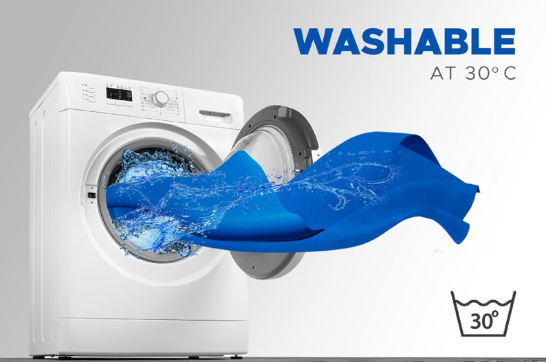 May include: A white washing machine with a blue fabric coming out of the door. The fabric is wet and has water droplets on it. The text "WASHABLE AT 30&deg;C" is displayed above the washing machine. A washing instruction symbol is displayed below the washing machine, showing a basin with 30&deg;C written inside.