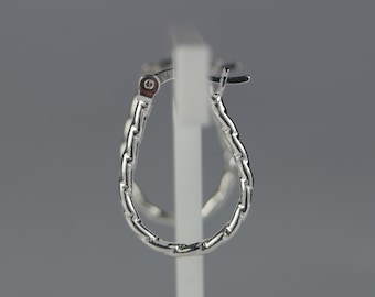 May include: A single silver hoop earring with a textured, chain-like design. The earring is oval-shaped and has a hinged closure. The background is a solid gray.