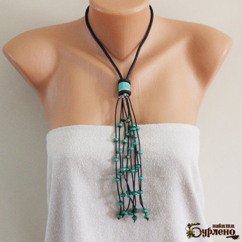 Long pendant blue necklace Boho pendant necklace with turquoise beads Art necklace with a blue semiprecious stone and black lether cords