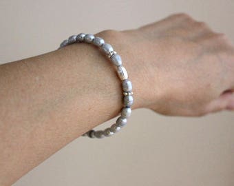 Beaded bracelet with natural freshwater light purple pearls and and sterling silver 925