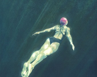 May include: A woman in a pink swim cap and black swimsuit swims underwater. The water is a dark teal color and sunlight streams through the surface.