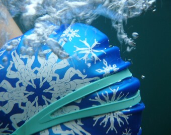 Nancy Farmer swimming hat "Swimflakes" on high quality silicone - snowflake synchronized swimmers on a swim cap