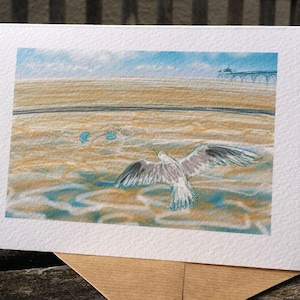 Wenskaart voor zwemmers: 'Arctic Breeze' - Clevedon Marine lake met zeemeeuw en zwemmer, Open Water, zwemmen in koud water. Nancy Boer