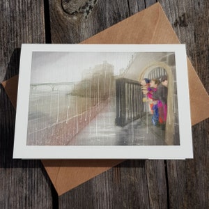 greetings card:  “You&#39;re not going to swim in this weather?” Clevedon Swimmers at Clevedon pier, swimming in the rain