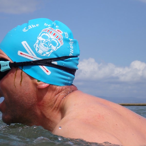 Standard size - "Cake Before Dishonour" - swim cap / pirate swimming hat by Nancy Farmer. Skull and Crossbones, in black or bright colours