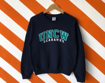 NCAA UNC Wilmington PPNCW010 Toddler 3/4 Sleeve Baseball T-Shirt NCAA UNC Wilmington PPNCW010 Toddler 3/4 Sleeve Baseball T-Shirt