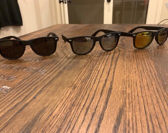 Ce sont nos lunettes de soleil minimalistes qui sont UV400, polarisées et légères ! Ceux-ci ont été créés pour la personne en déplacement!