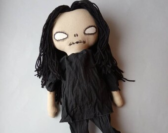 creepy cloth doll