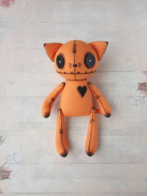 creepy cat doll