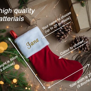 May include: Red velvet Christmas stocking with a white faux fur cuff. The stocking is personalized with the name "Jane" in gold embroidery. The stocking measures 19.6 inches tall and 9.8 inches wide.