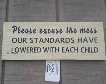 Please excuse the mess our standards have lowered with each child sign