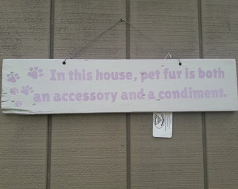 In this house pet fur is both an accessory and a condiment sign