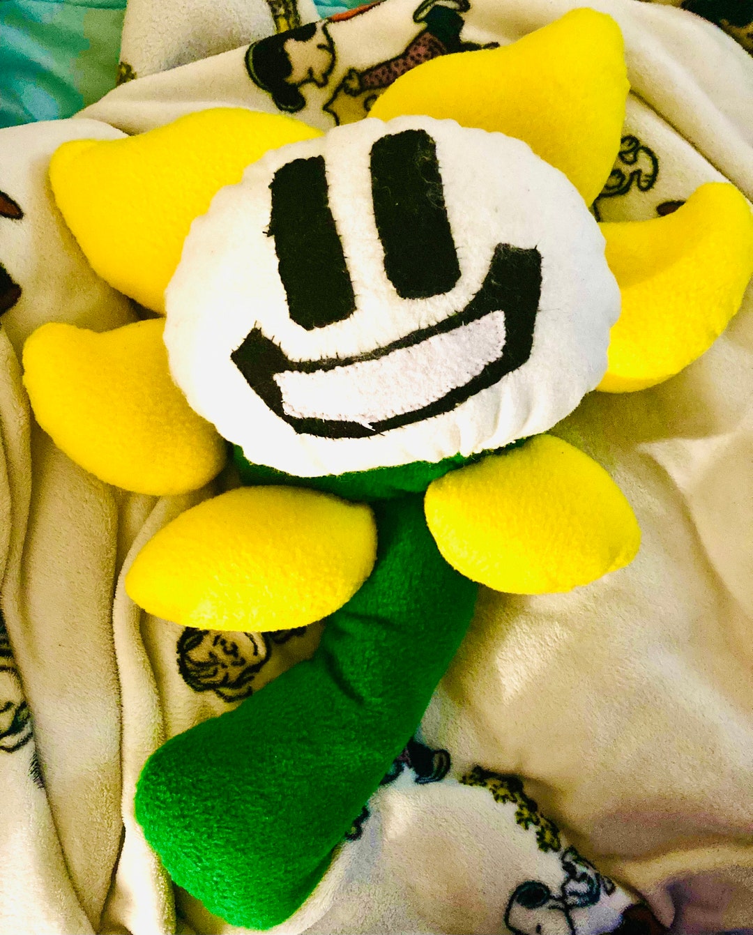 So I received my Flowey plushie and this is the first thing I did