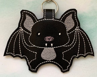 Bat hand sanitizer holder