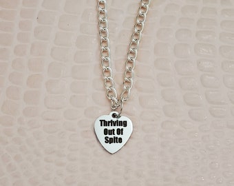 Thriving Out Of Spite Heart Charm Necklace