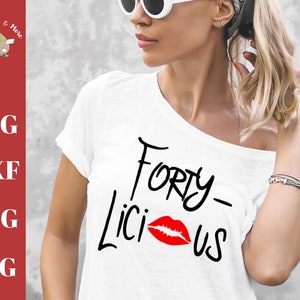 May include: White t-shirt with black text that says "Forty-licious" with a red lip print.