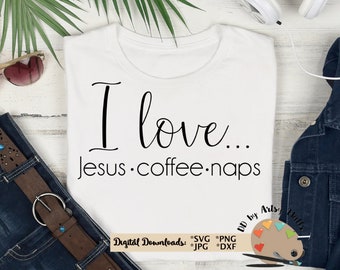 May include: White t-shirt with the text "I love... Jesus. coffee. naps" in black lettering. The shirt is on a white surface with a pair of sunglasses, a denim jacket, and a brown belt with a silver buckle.
