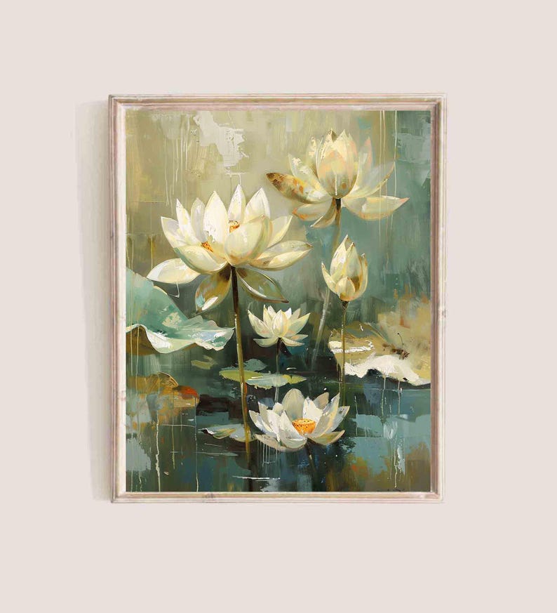 May include: A framed painting of white lotus flowers with yellow centers and green lily pads. The artwork has a textured, impressionistic style with a muted color palette of greens, blues, and creams. The frame is a light wood color.