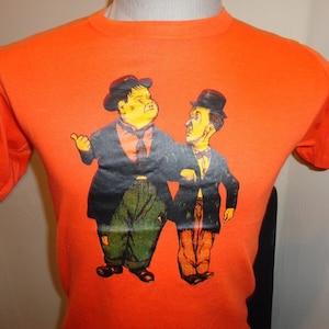 Vintage 80's Orange Laurel & Hardy Comedy T-shirt Fits Adult S Stan and Ollie