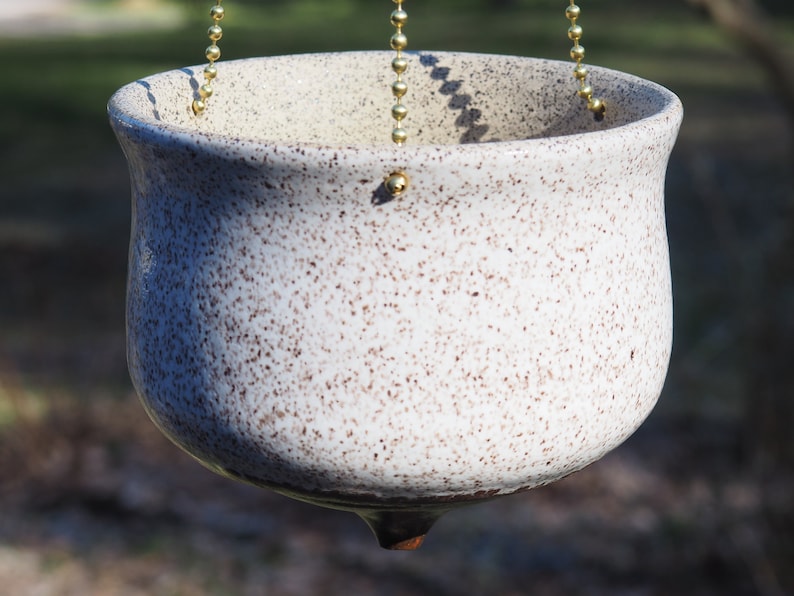 Hanging white speckled ceramic planter image 1