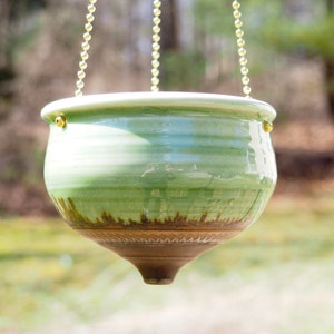 Hanging green ceramic planter image 1