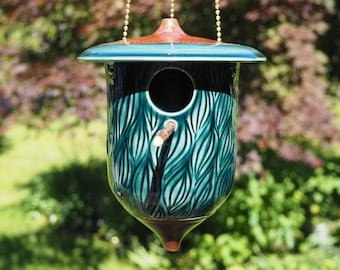 Hand-carved pottery birdhouse, Whispering Pines Estate
