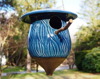 Hand-carved pottery birdhouse, Blue Moon Manor