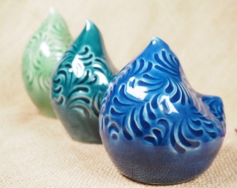 Abstract ceramic bird sculpture