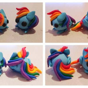 May include: Four views of handmade clay figurines. Each figurine is a light blue pony with a rainbow mane and tail. The eyes are black with glitter. The figurines are on a light surface.