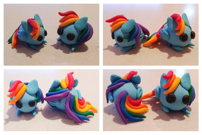 May include: Four views of handmade clay figurines. Each figurine is a light blue pony with a rainbow mane and tail. The eyes are black with glitter. The figurines are on a light surface.