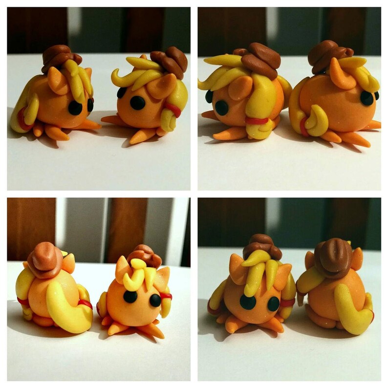 May include: Four small, orange clay figures of cartoon ponies, each with a brown cowboy hat and yellow hair. The ponies have black eyes and red accents. The figures are arranged in a grid pattern.