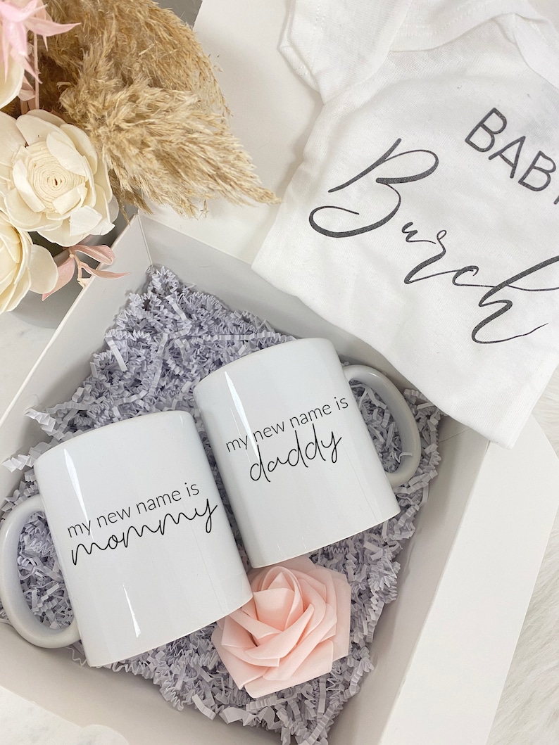 My new name is Mama papa mommy daddy mugs new mom dad parents expecting parents gift box baby announcement gender reveal pregnancy onesi image 2