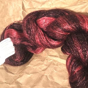 Art Yarns Rhapsody Glitter Light Yarn. 85% Silk/15 Mohair. New/Unused. Original labels. Each hank 50g./366m.