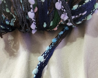 Rozetti Spectra yarn. Weighs 100g. Multicolored and kept in a smoke free environment. No label.