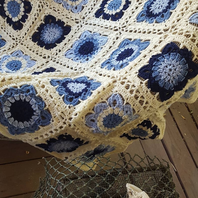 Crocheted Granny Square Blanket Based on DROPS SEASIDE BLUES pattern.
