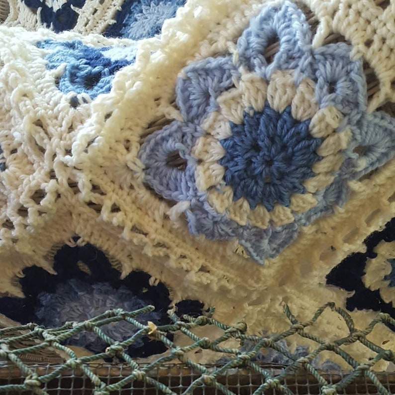Crocheted Granny Square Blanket Based on DROPS SEASIDE BLUES pattern.