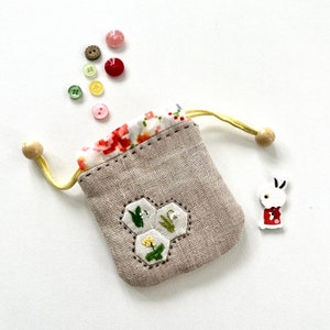 Mini sacchetto del tesoro con coulisse