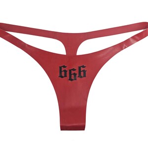 May include: Red lace thong with a black "666" graphic.