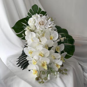 Cascading White Rose Orchid Wedding Bouquet: Tropical Monstera & Palm