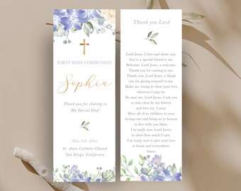 May include: A white bookmark with a gold cross and the text "First Holy Communion Sophia" and a floral design with blue and green flowers. The back of the bookmark has a prayer to Jesus with the text "Thank you Lord".