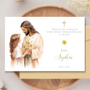 Biglietto di ringraziamento per la Prima Comunione modificabile per una bambina con illustrazione di una bambina con Gesù e fiori rosa, modello - CP41
