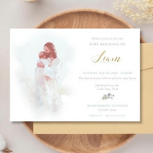May include: A baby blessing invitation with an illustration of Jesus holding a child. The invitation includes the name "Liam" in gold script, event details, and the phrase "Please join us for the BABY BLESSING OF". The invitation is on a white background.