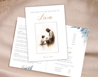 May include: Baptism invitation featuring a watercolor illustration of Jesus with a child. The invitation is white with gold script and blue floral accents. The text reads "Welcome to the Baptism of Liam" and "May 5, 20xx".