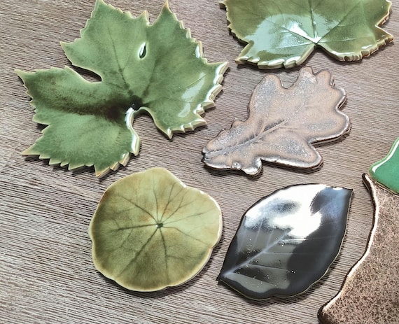 Handmade Ceramic Mosaic Leaves Tiles. Price for 2 meters square of different types of leaves in greens, copper and gold glazes